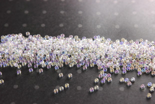 Бисер Чехия круглый 10/0 50г 58135 прозрачный/перламутровый