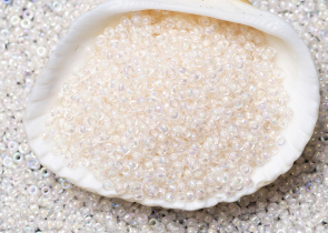 Бисер Япония MIYUKI Seed Beads 15/0 100г 0281 бледный кристалл радужный персиковая линия внутри — фото 3